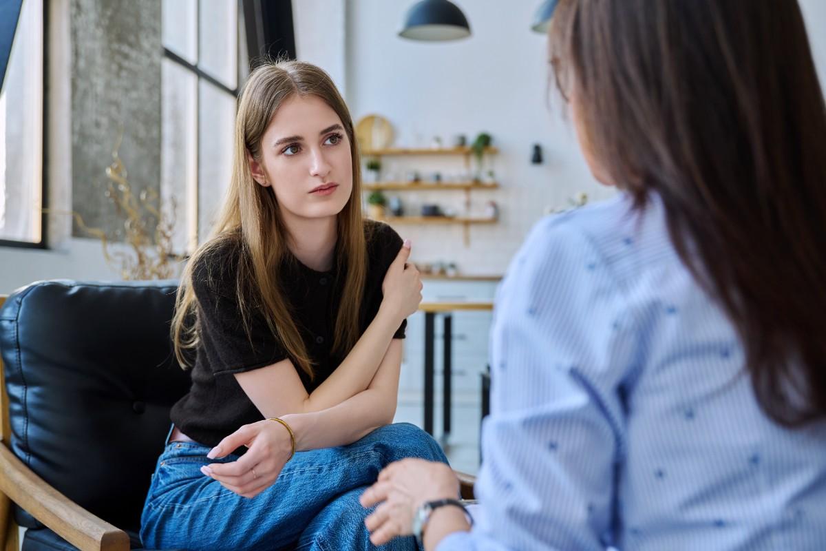 Therapy consultation between a mental health professional and a client
